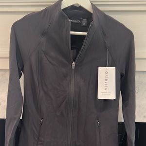 Athleta, Salutation Jacket in black, size x-small. Never worn with tags!